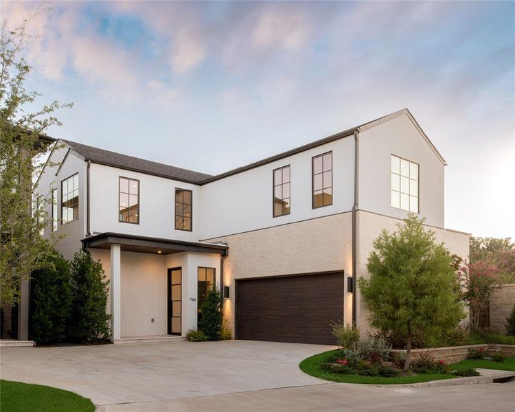 Front exterior of a new home in , Dallas, TX, highlighting curb appeal (Image 19).