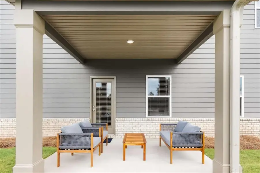 Exterior details and patio area of a home in Millstone Manor, Conyers (Image 2). Exterior details and patio area of a home in Millstone Manor, Conyers (Image 2).