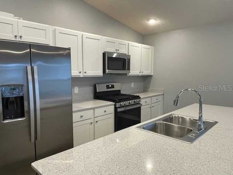 Furnished interior view inside a new home in , The Villages (Image 12).