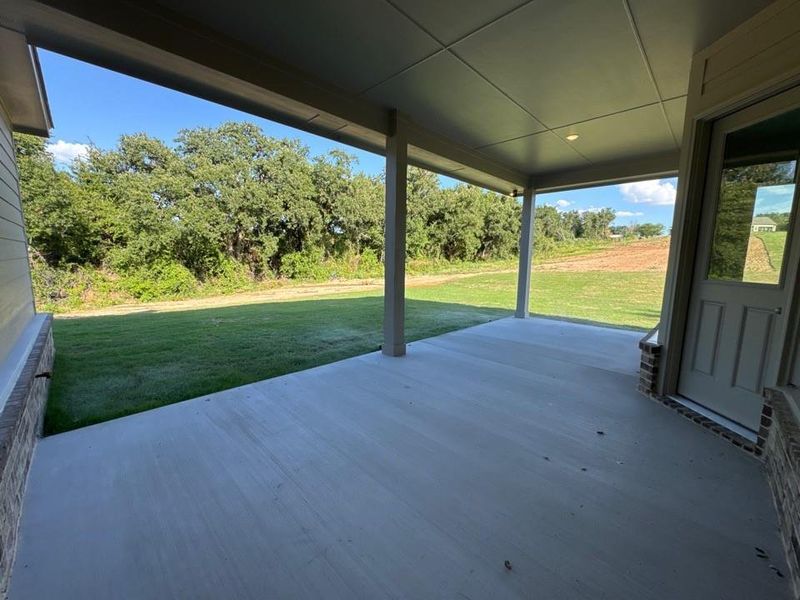 Exterior details and patio area of a home in Oak Grove Addition, Springtown (Image 3).