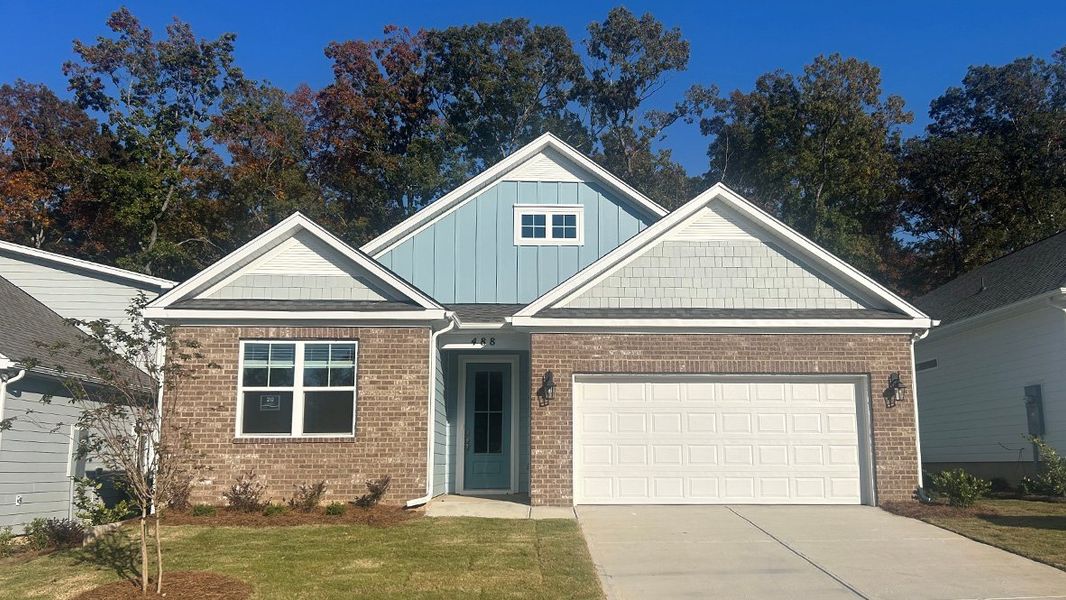 Front exterior of a new home in Cross Creek, Lexington, SC, highlighting curb appeal (Image 1).