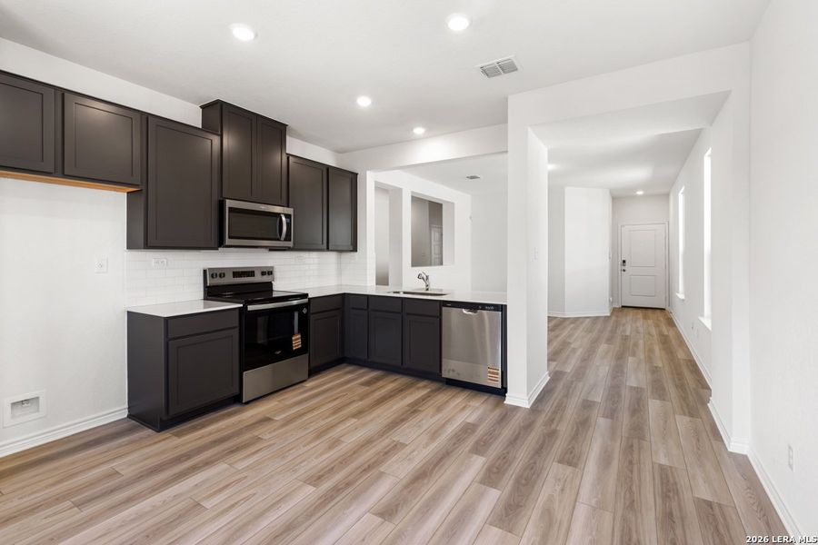 Furnished interior view inside a new home in Knox Ridge, Converse (Image 10).