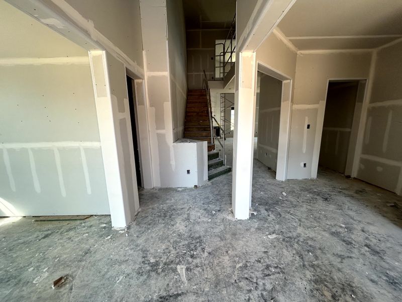 Construction progress - entryway open to formal dining and living room