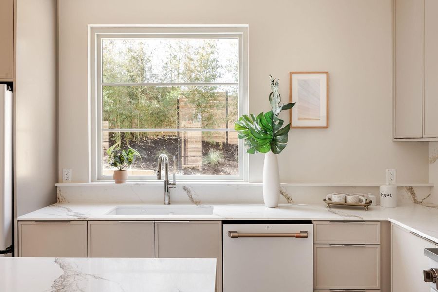 Beautiful view into the backyard from kitchen.