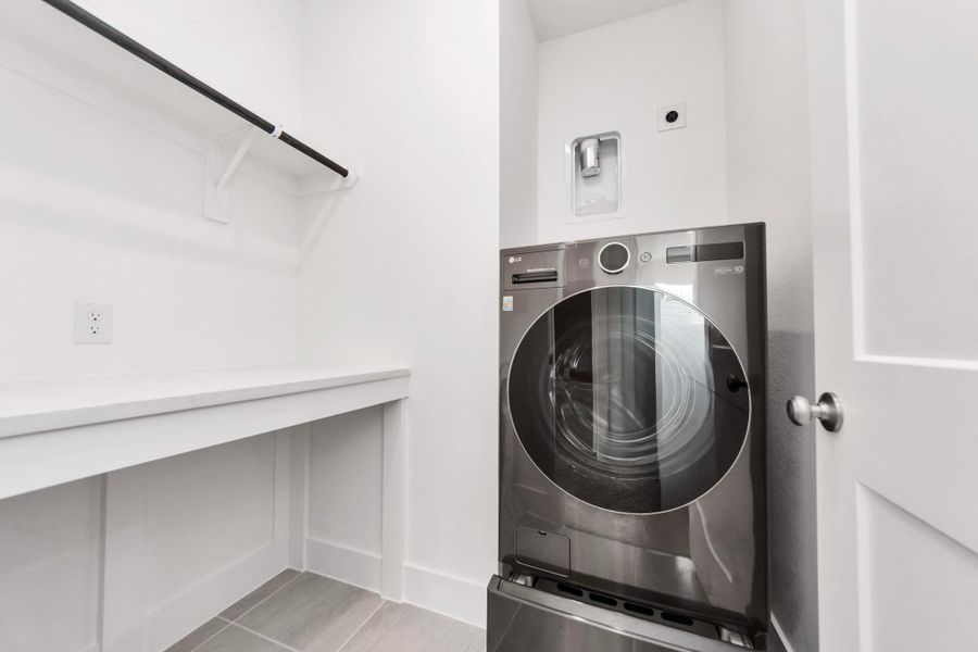 Furnished interior view inside a new home in Sienna, Missouri City (Image 11).