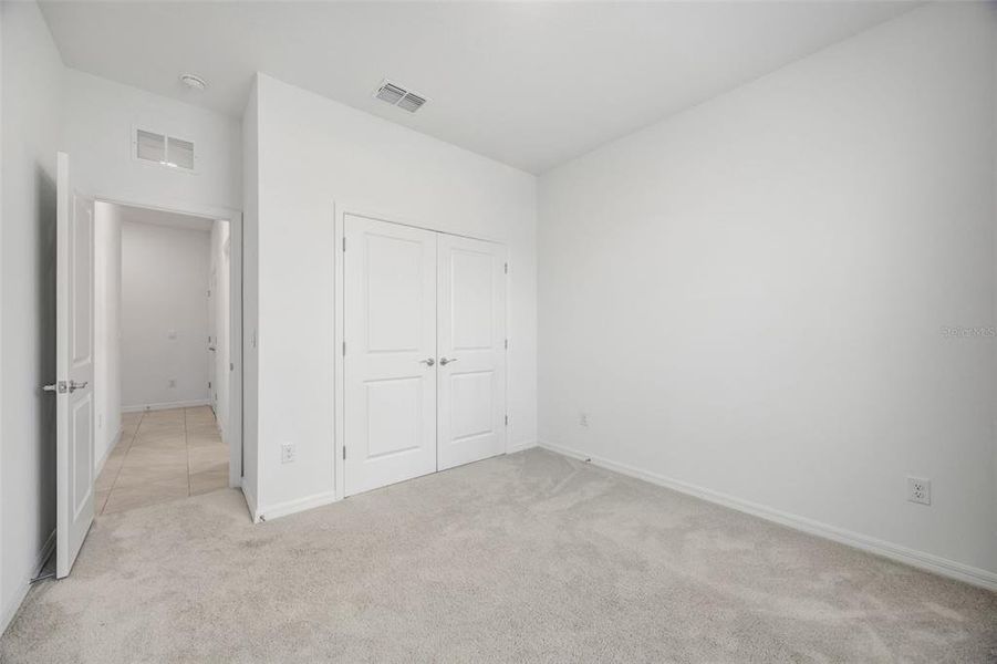 Spacious, unfurnished interior of a new home in Woodcreek, Wesley Chapel (Image 36).