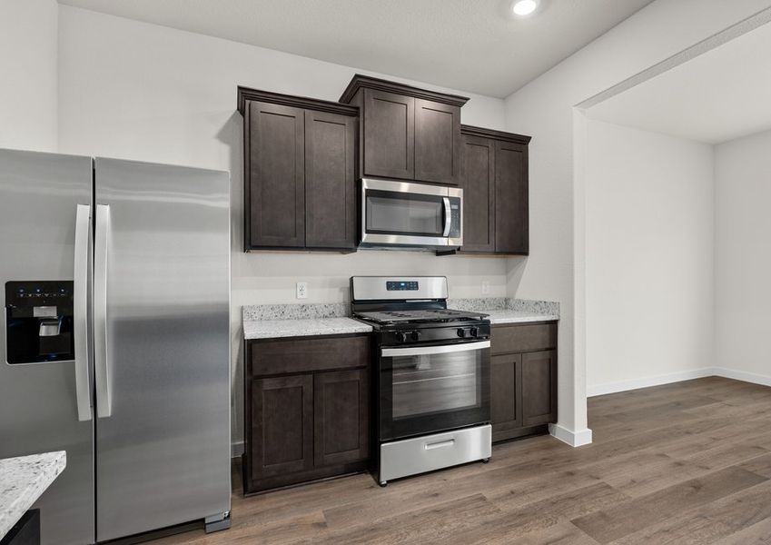 The kitchen has sprawling granite countertops. The kitchen has sprawling granite countertops.
