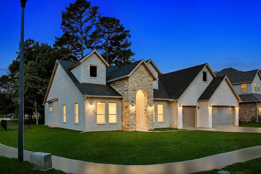 Front exterior of a new home in , Conroe, TX, highlighting curb appeal (Image 2). Front exterior of a new home in , Conroe, TX, highlighting curb appeal (Image 2).