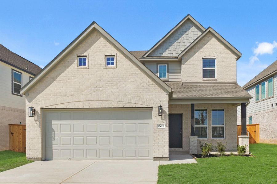 Front exterior of a new home in Huntington Place, Rosharon, TX, highlighting curb appeal (Image 1). Front exterior of a new home in Huntington Place, Rosharon, TX, highlighting curb appeal (Image 1).
