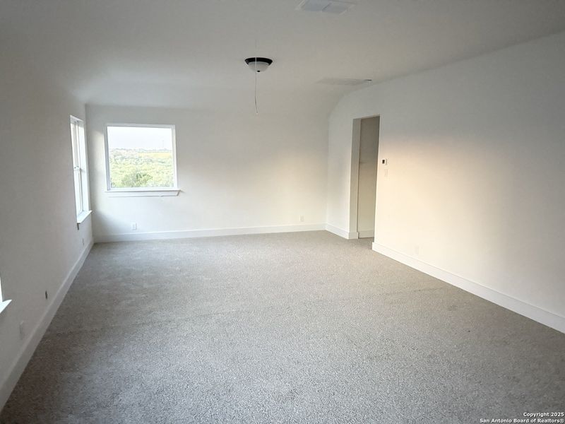 Spacious, unfurnished interior of a new home in Buffalo Crossing – New Phase Now Preselling, Cibolo (Image 14).