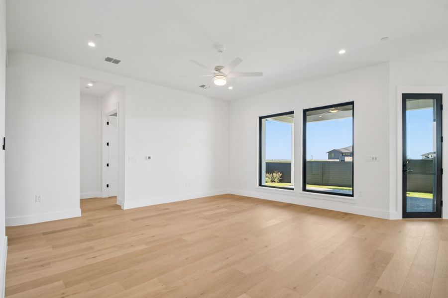 Spacious, unfurnished interior of a new home in Milky Way at River Place, Austin (Image 42).