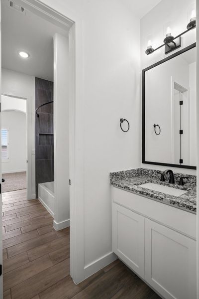 Representative furnished interior of a home built from the Scottsdale by LEH. Homes in Verdancia, El Paso (Image 37).