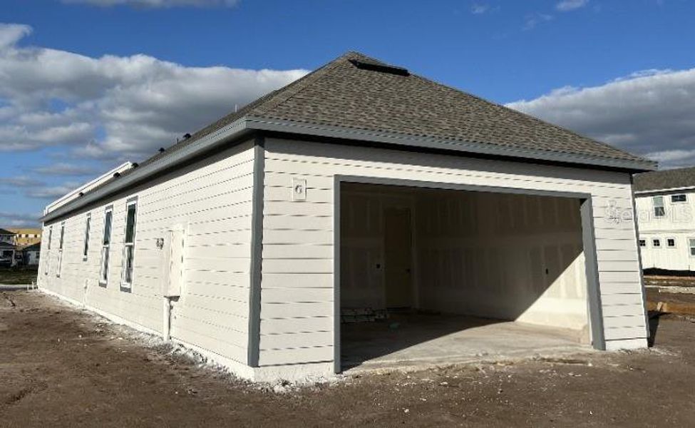 In-progress construction of a new home in Weslyn Park Single Family, St. Cloud, FL (Image 19).