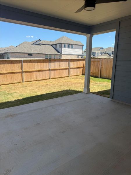 Exterior details and patio area of a home in Lariat, Liberty Hill (Image 3).