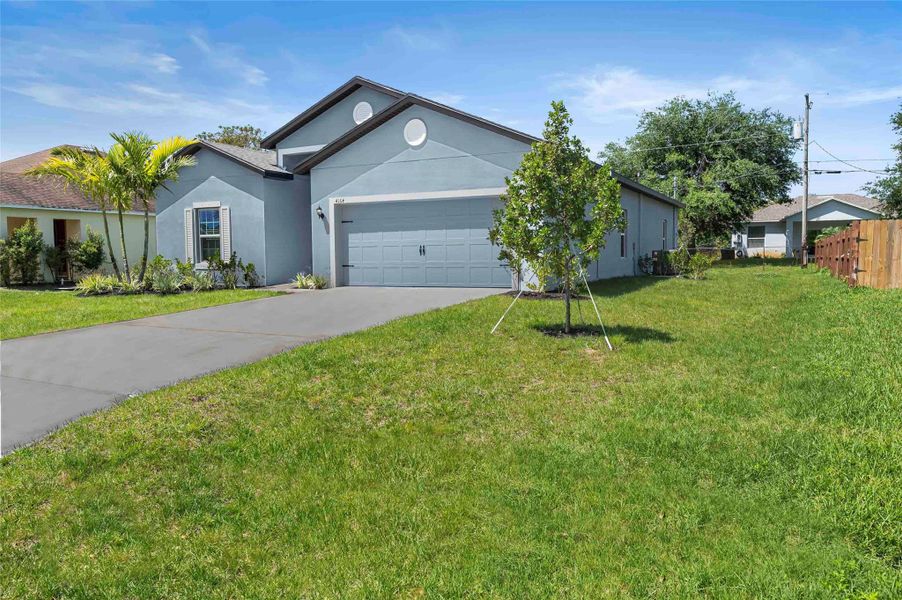 Front exterior of a new home in Port St Lucie, Port St. Lucie, FL, highlighting curb appeal (Image 1). Front exterior of a new home in Port St Lucie, Port St. Lucie, FL, highlighting curb appeal (Image 1).