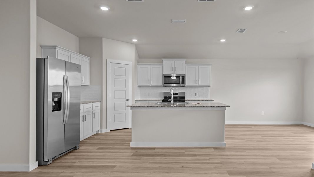 Representative furnished interior of a home built from the DEAN by D.R. Horton in Heritage Parks, Abilene (Image 6).