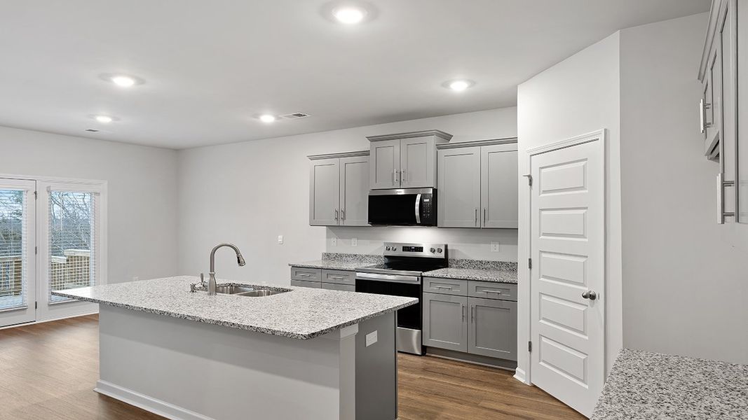 Furnished interior view inside a new home in Southwind Village, Evans (Image 4).