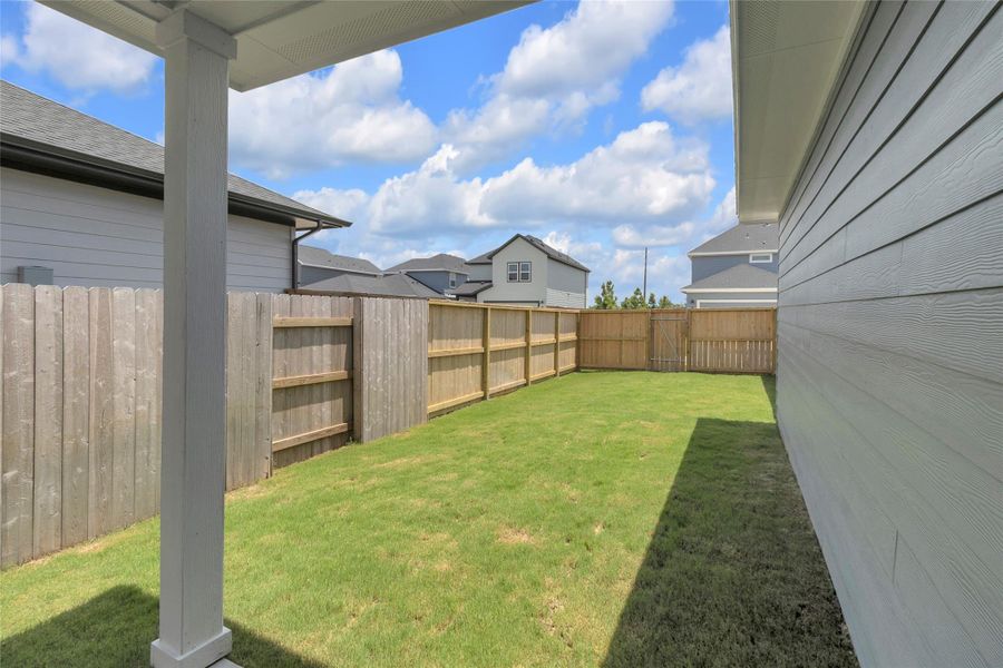 Exterior details and patio area of a home in Elyson, Katy (Image 3).
