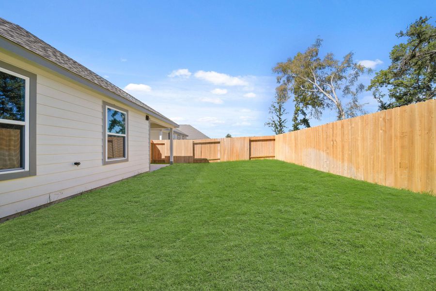 Exterior details and patio area of a home in Cypresswood Landing, Humble (Image 4).