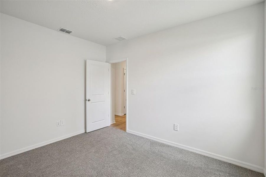 Spacious, unfurnished interior of a new home in Two Rivers - Premier Series, Zephyrhills (Image 28). Spacious, unfurnished interior of a new home in Two Rivers - Premier Series, Zephyrhills (Image 28).