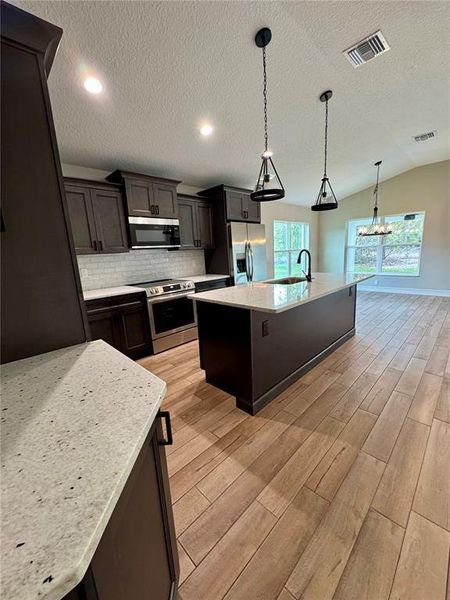 Furnished interior view inside a new home in , Dunnellon (Image 8).