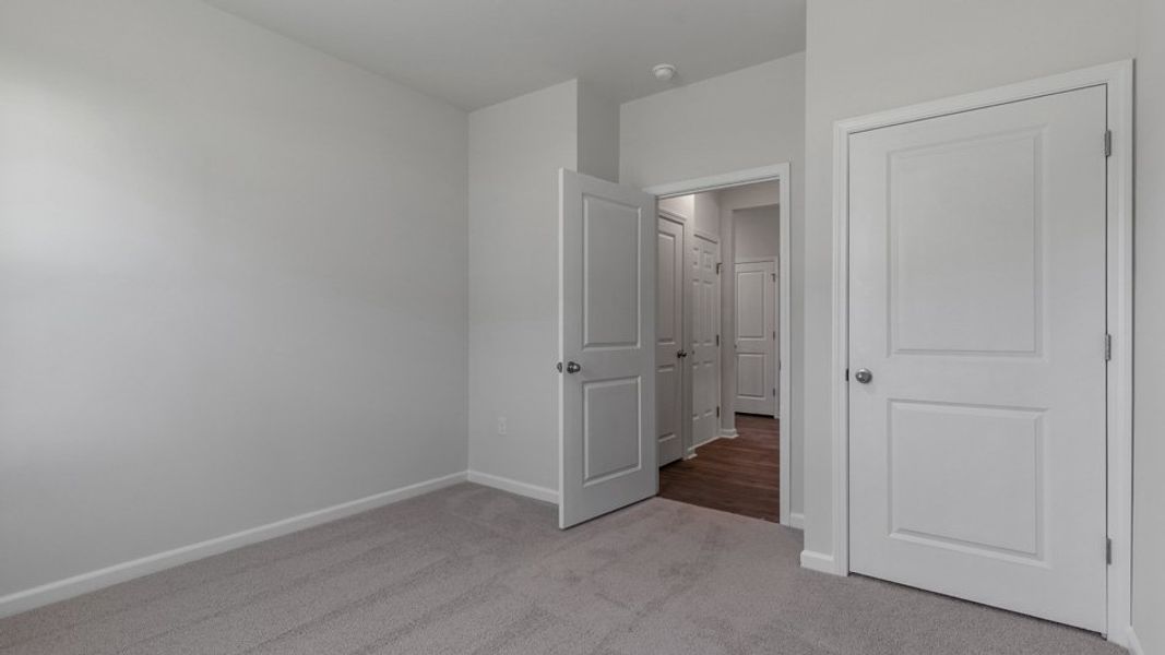 Spacious, unfurnished interior of a new home in Swift Creek Farm, Clayton (Image 21).