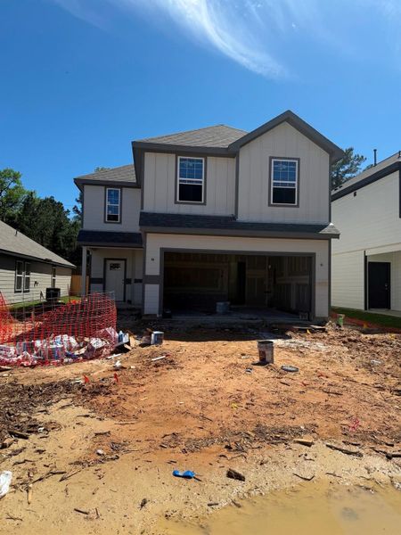 In-progress construction of a new home in River's Edge, Conroe, TX (Image 25).