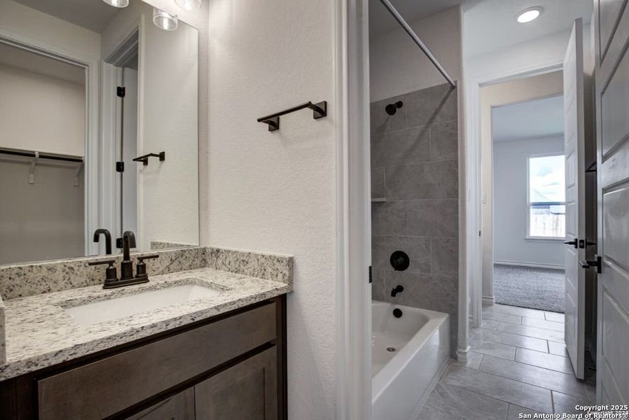Furnished interior view inside a new home in The Reserve at Potranco Oaks, Castroville (Image 77).