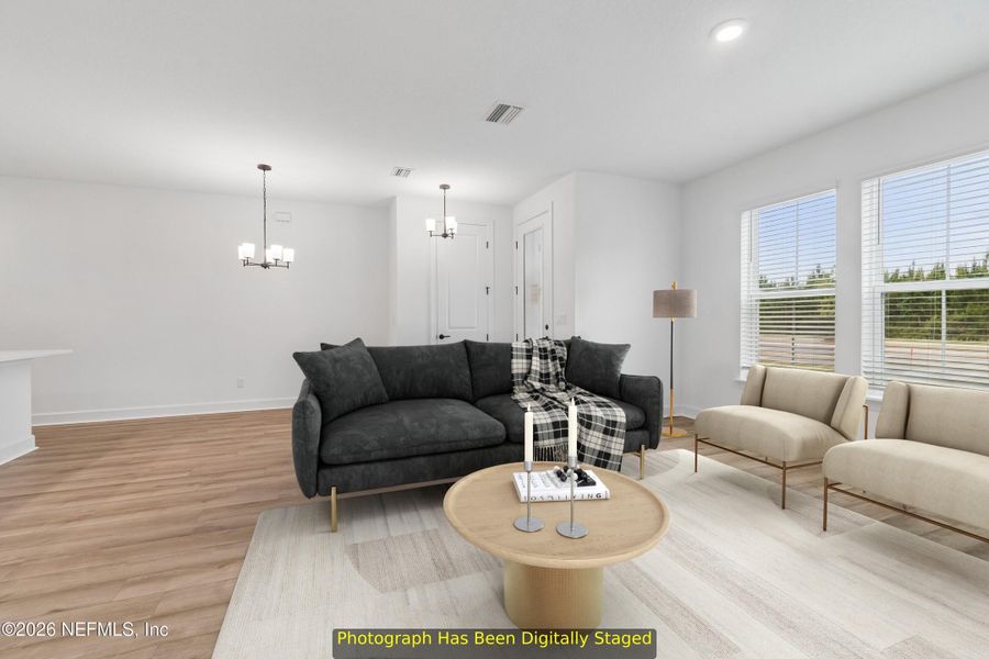 Furnished interior view inside a new home in Westerly Park at Wildlight - Courtyard Collection, Yulee (Image 9).