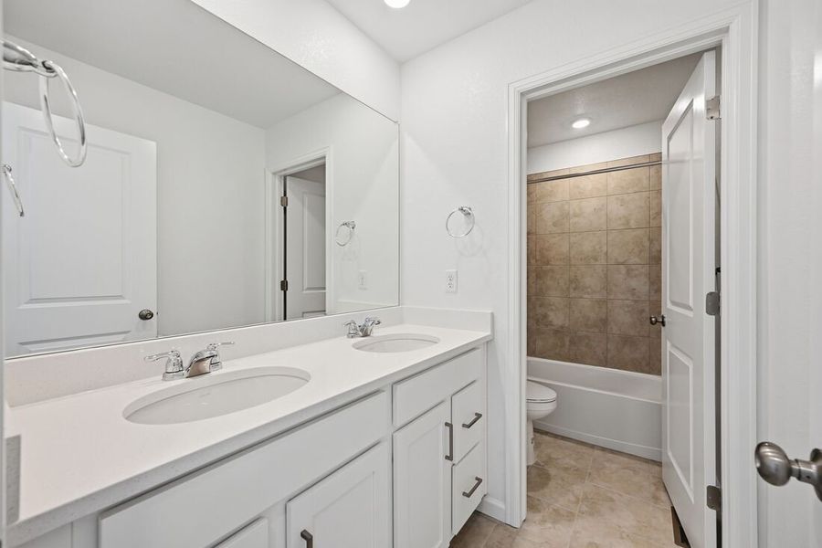 Furnished interior view inside a new home in Trailstone Town Collection, Arvada (Image 12).