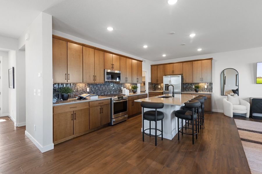Representative furnished interior of a home built from the The Sunlight by Risewell Homes in Cordovan, Firestone (Image 5).