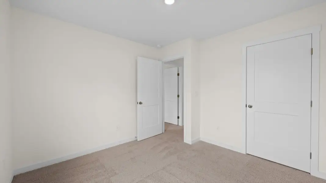 Representative unfurnished interior of a home built from the Tatum Townhome by D.R. Horton in Cherokee Overlook, Sevierville (Image 21).