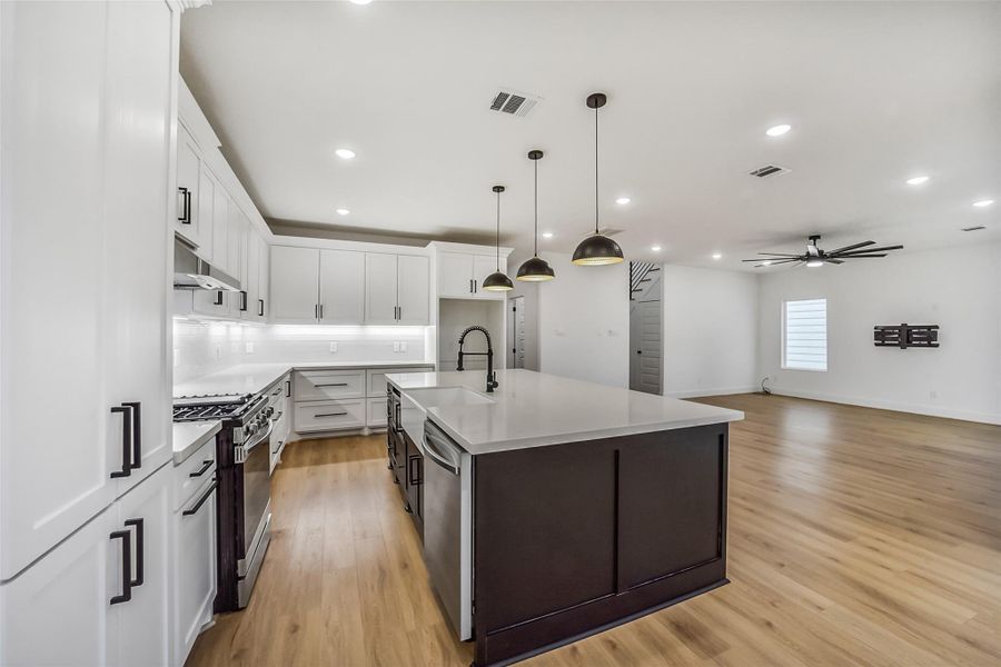 Open concept kitchen and spacious living area.
