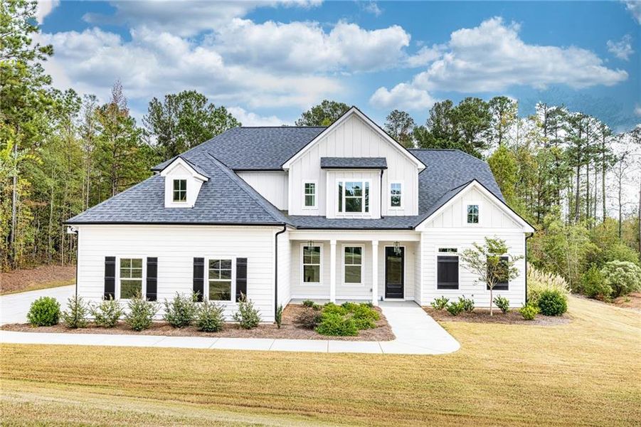 Front exterior of a new home in Platinum Ridge, Sharpsburg, GA, highlighting curb appeal (Image 1).