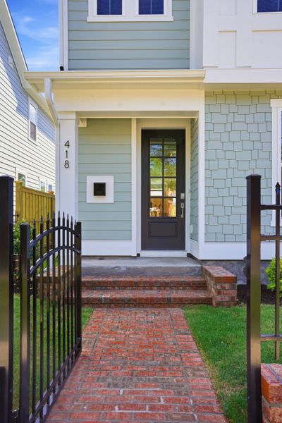 Representative exterior details of a home built from the The Remington by RobuckHomes in Downtown Wilmington Collective, Wilmington (Image 52). Representative exterior details of a home built from the The Remington by RobuckHomes in Downtown Wilmington Collective, Wilmington (Image 52).
