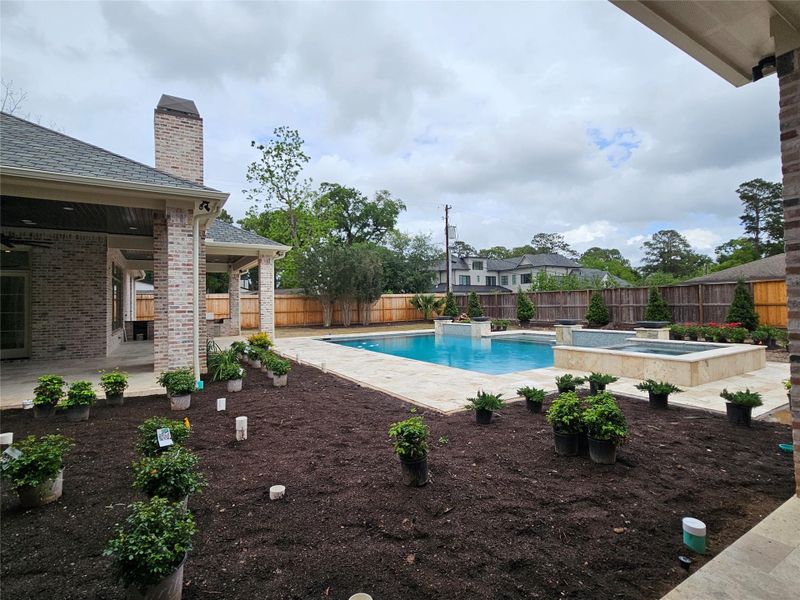 Photo Update April 2026 - Please Excuse the Mud! - Landscaping going in, pool is complete! More to come!