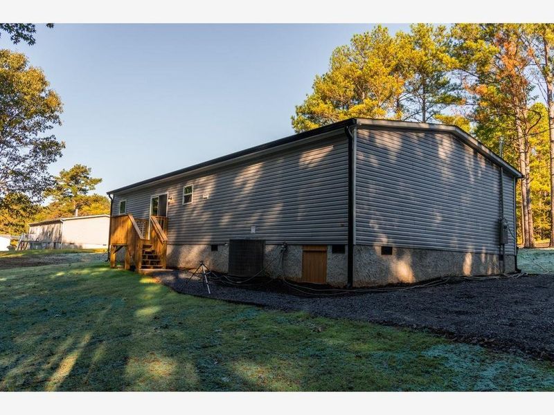 Exterior details and patio area of a home in , Taylorsville (Image 15).