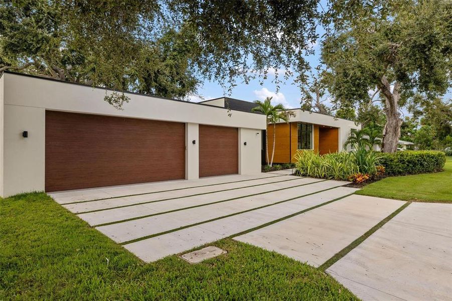 Front exterior of a new home in , Sarasota, FL, highlighting curb appeal (Image 28).