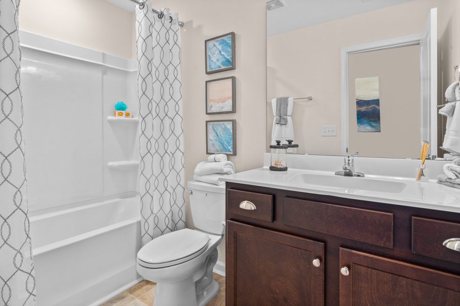 Representative furnished interior of a home built from the The Cherry Grove by Chesapeake Homes in The Willows, Loris (Image 29).