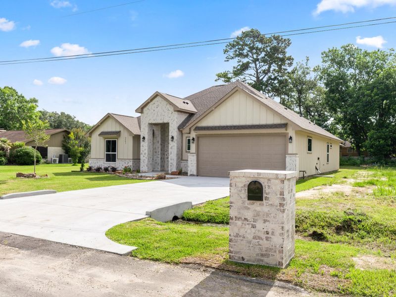 Front exterior of a new home in , Bay City, TX, highlighting curb appeal (Image 18).