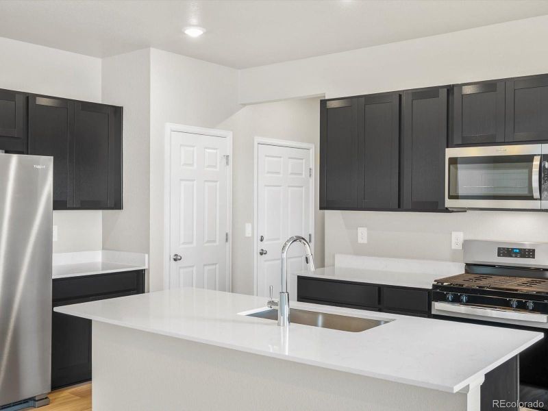Furnished interior view inside a new home in Lake Bluff, Greeley (Image 7).