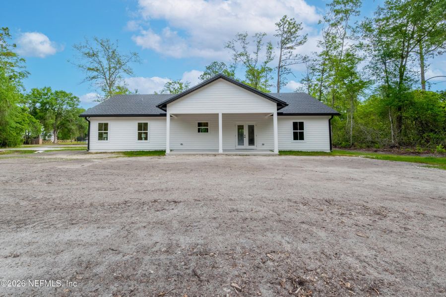 Exterior details and patio area of a home in , Starke (Image 32).