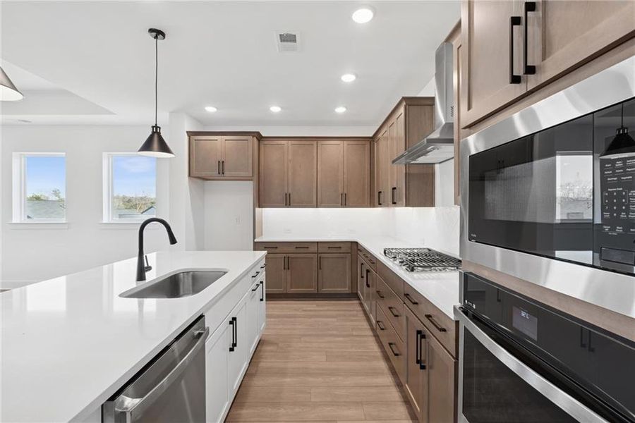 Furnished interior view inside a new home in Crescent Pointe at Great Sky, Canton (Image 8).