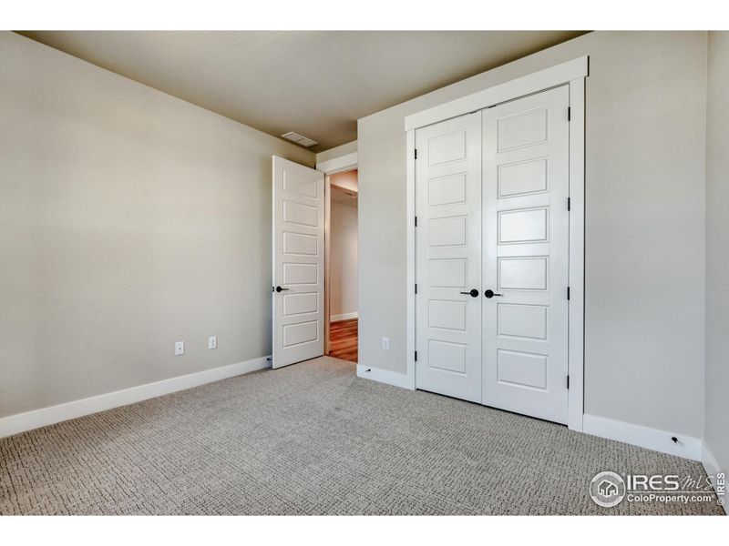 Spacious, unfurnished interior of a new home in Barefoot Lakes, Firestone (Image 24).