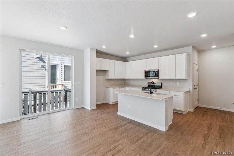 Furnished interior view inside a new home in Paired Homes at Alder Creek, Parker (Image 8).