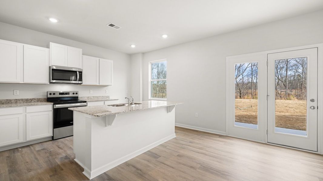 Representative furnished interior of a home built from the Penwell by D.R. Horton in Oakleigh Glen, Dallas (Image 4).