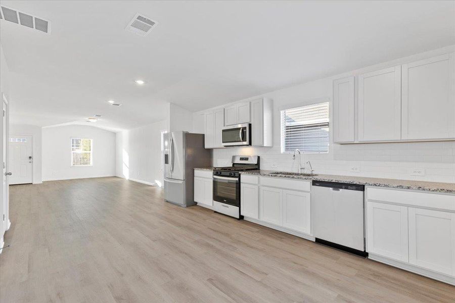 Furnished interior view inside a new home in Waterstone Crossing, Kyle (Image 5). Furnished interior view inside a new home in Waterstone Crossing, Kyle (Image 5).