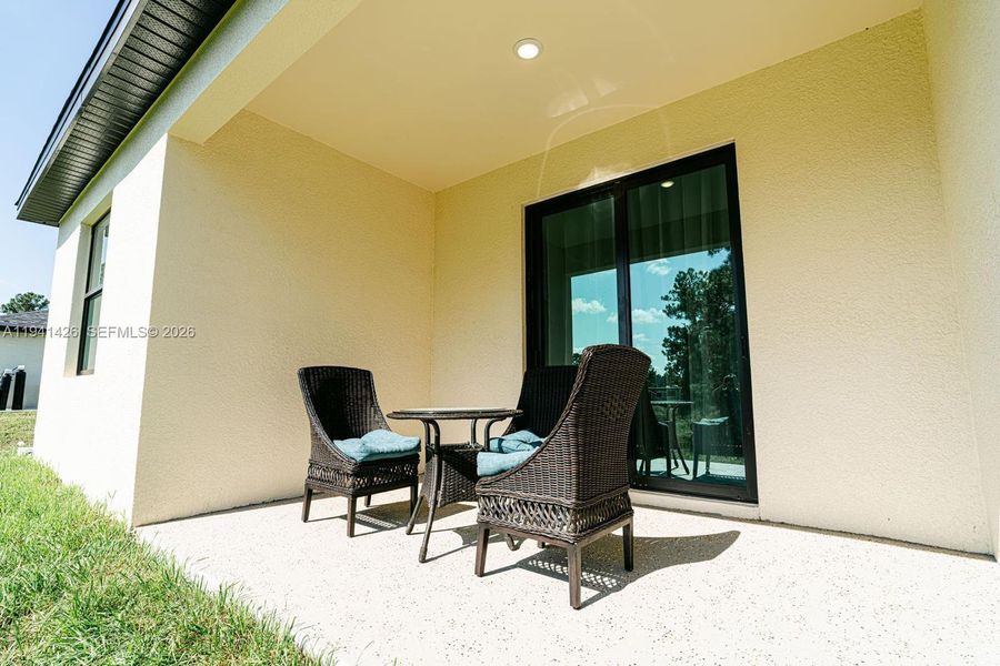 Exterior details and patio area of a home in , Lehigh Acres (Image 3).