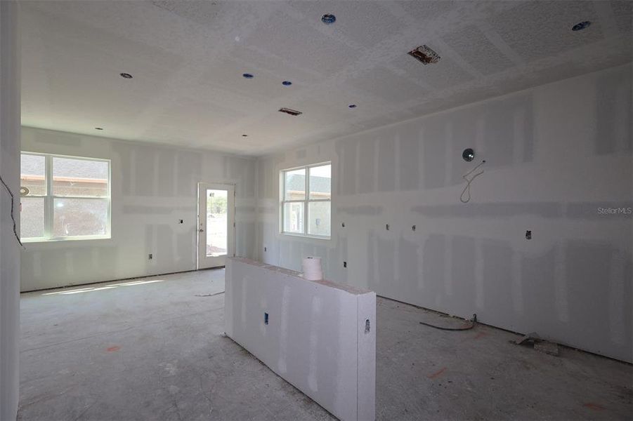 In-progress construction of a new home in Center Lake on the Park, St. Cloud, FL (Image 11).