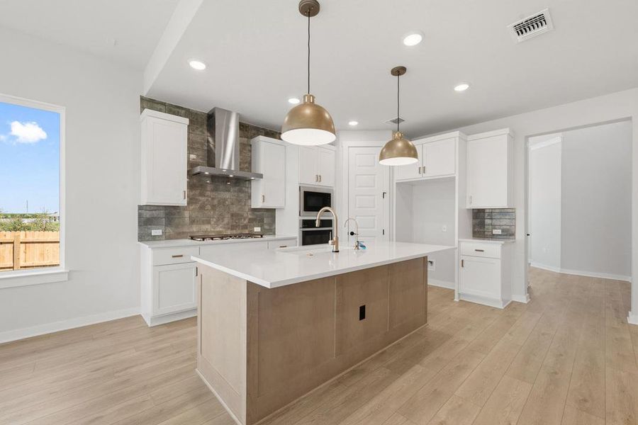 Furnished interior view inside a new home in Terrace Collection At Turner's Crossing, Buda (Image 13).